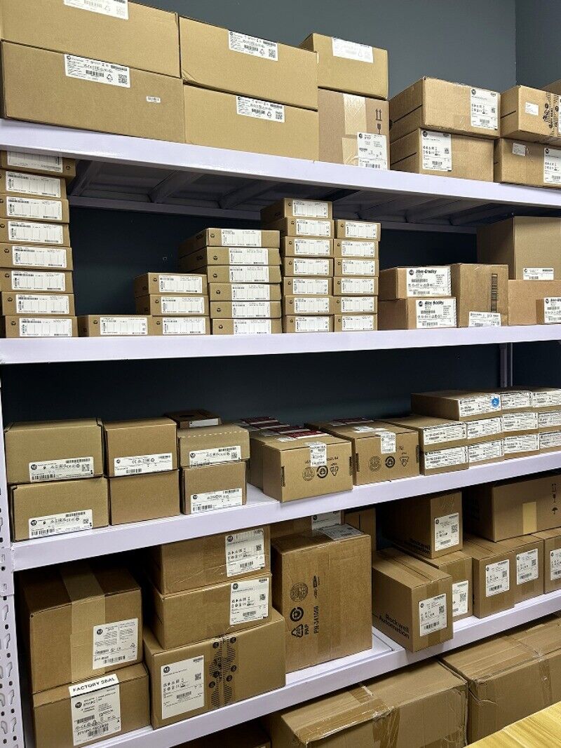 Allen-Bradley PowerFlex 753 AC drives boxes on warehouse shelves, ready for industrial automation.