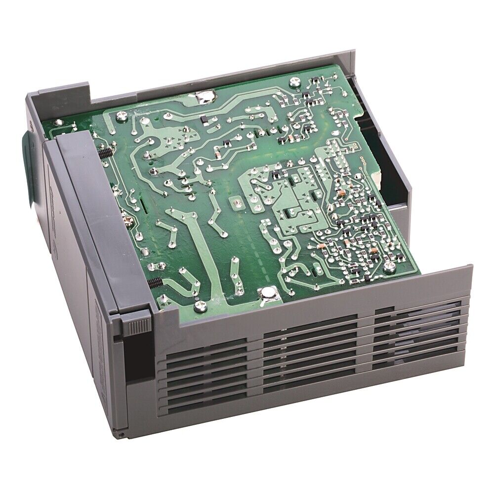 Allen-Bradley 1746-P3 SLC 500 Module. Electronic circuit board with gray casing. PLC module for industrial automation.
