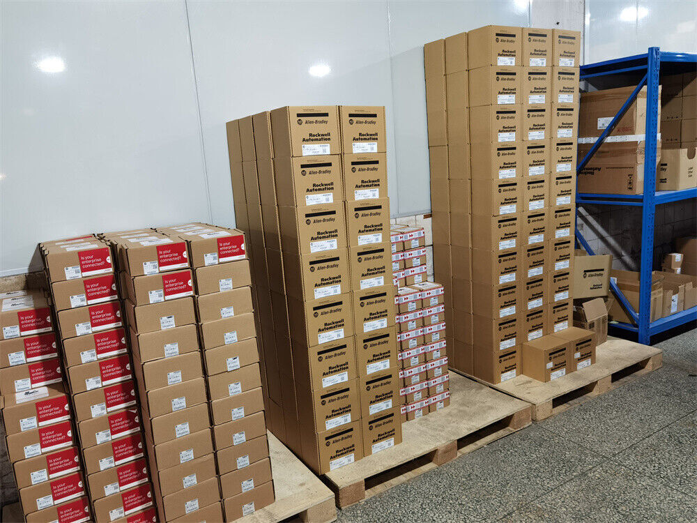 Allen-Bradley 1734-TBS POINT I/O Module Terminal Base boxes stacked on pallets, ready for fast shipping.