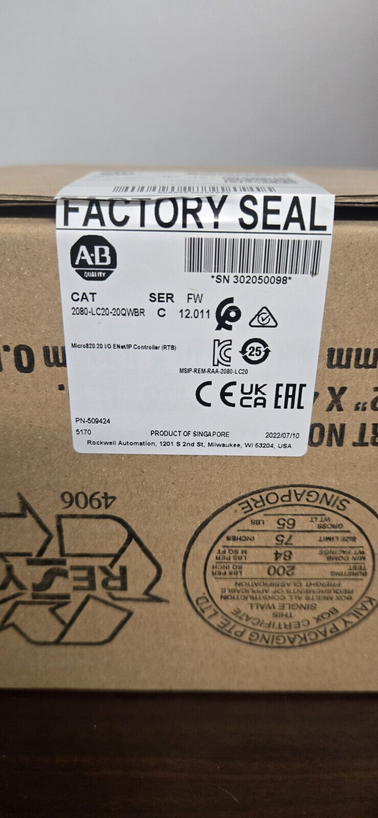 Allen-Bradley 2080-LC20-20QWBR PLC module in factory sealed box, product information. Factory seal, new in box.