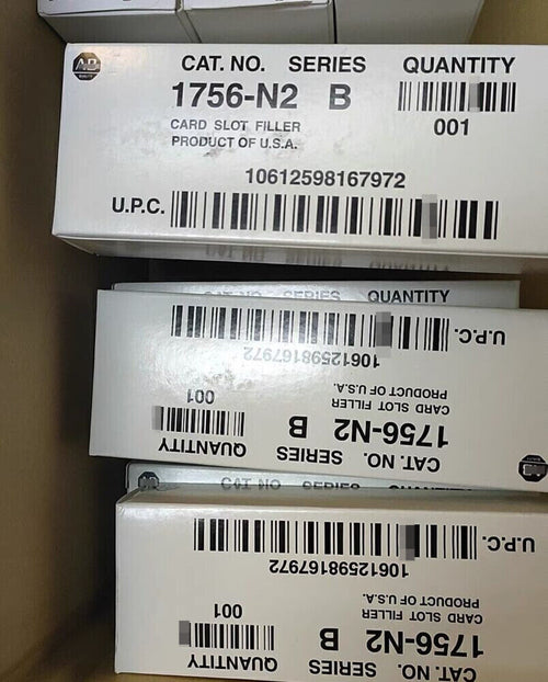 Allen-Bradley 1756-N2 slot filler boxes, white cardboard, product of USA, for ControlLogix chassis.
