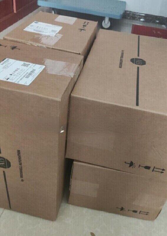 Allen-Bradley PowerFlex 70 AC Drive in boxes, ready to ship, industrial automation parts.