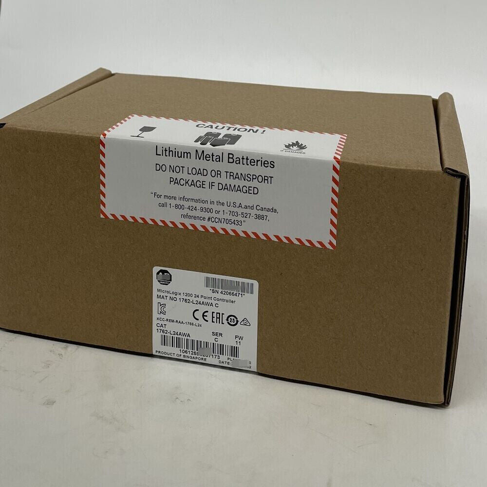 Allen-Bradley MicroLogix 1200 Controller shipping box, warning labels for lithium metal batteries.
