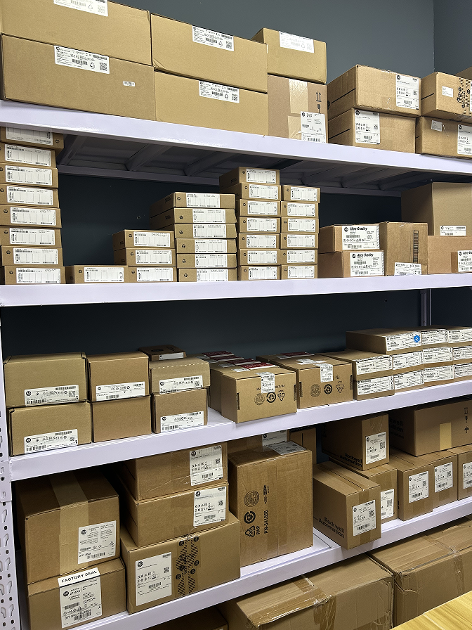 Allen-Bradley PanelView Plus 6 2711P-T10C4A8 terminals in boxes on warehouse shelves, factory sealed.
