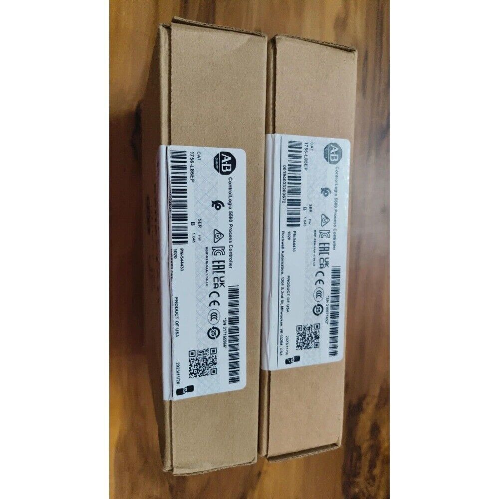 Two Allen-Bradley 1756-L85EP ControlLogix 5580 Process Controller Modules in boxes, labeled with product information.