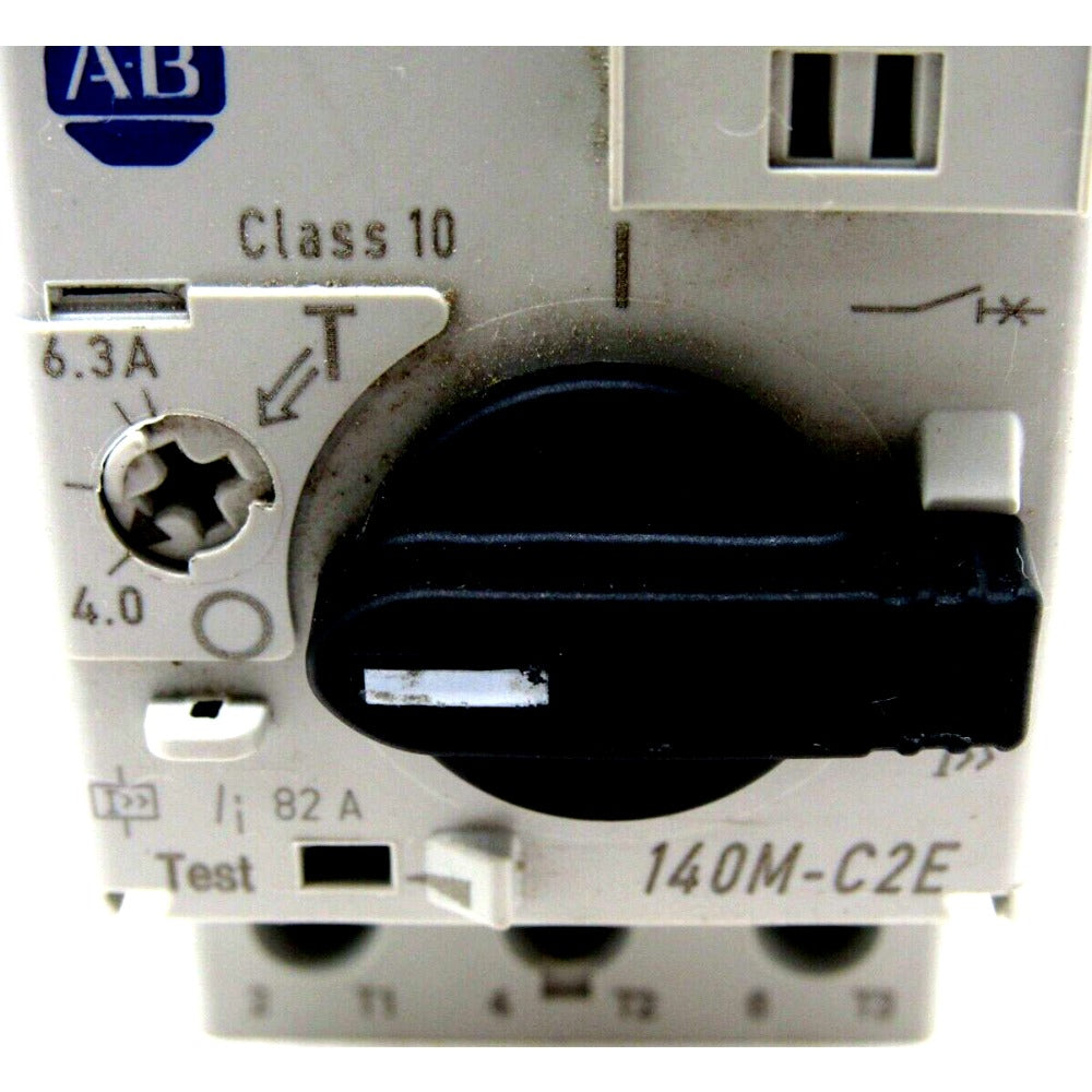 Allen-Bradley 140M-C2E Circuit Breaker close-up. Class 10, 6.3A setting, black switch. Industrial motor control.