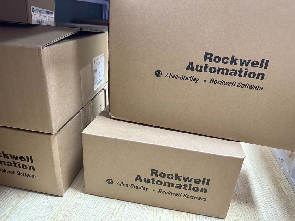 Allen-Bradley industrial automation parts in brown boxes, Rockwell Automation logo visible, PLC products for sale.