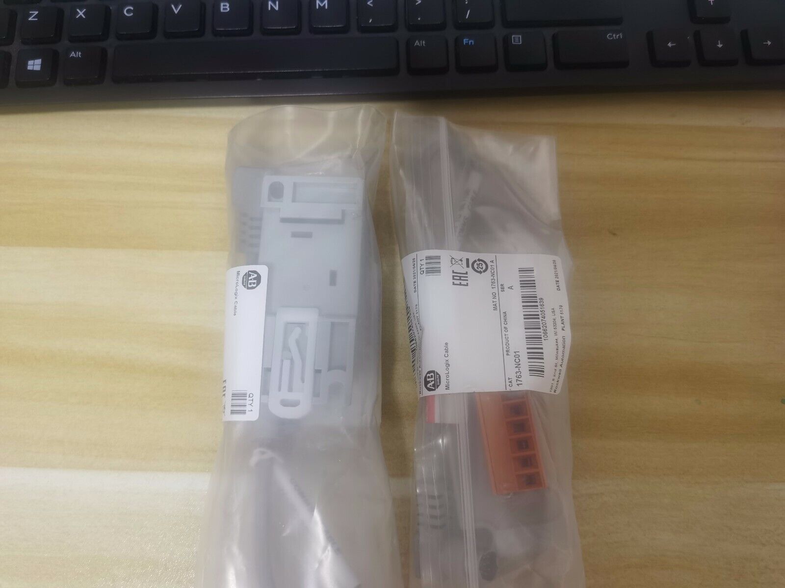 Allen-Bradley 1763-NC01 Comm Cable in sealed bag. Surplus PLC part with connector and terminal block.