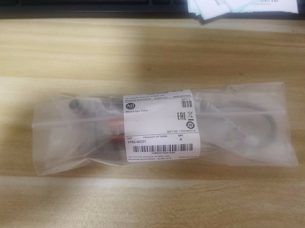 Allen-Bradley 1763-NC01 MicroLogix DH-485 Comm Cable in a sealed plastic bag, surplus product.