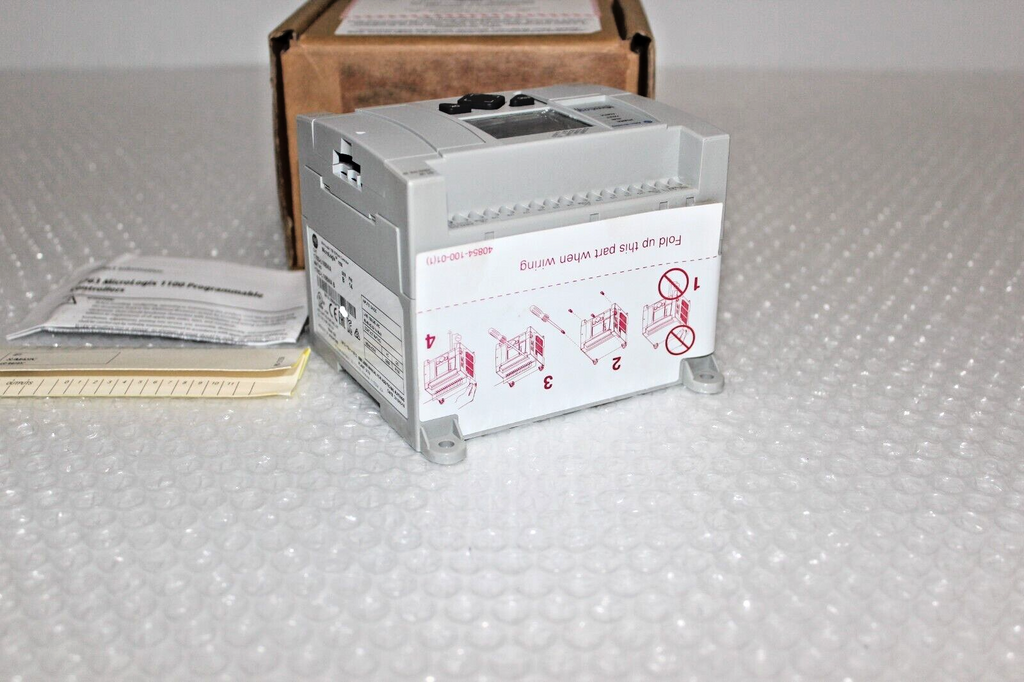 Allen-Bradley MicroLogix 1100 Programmable Controller, factory-sealed, with wiring instructions. Industrial automation part.